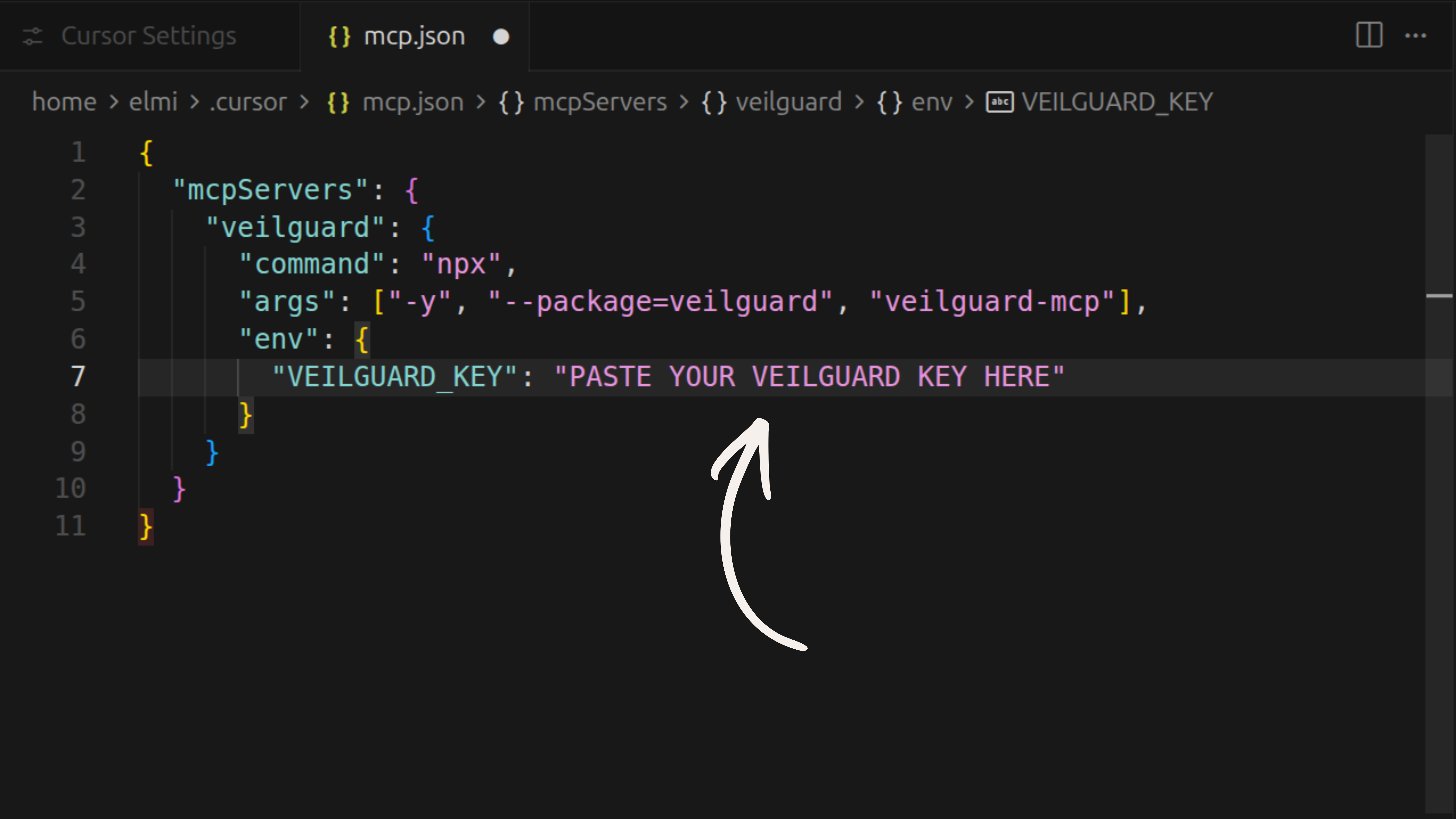 The mcp.json file with VEILGUARD_KEY field showing PASTE YOUR VEILGUARD KEY HERE with an arrow pointing to it